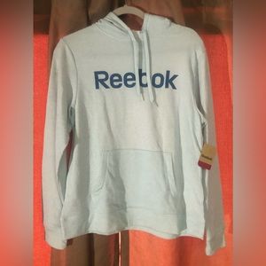 NWT. Women’s long sleeve shirt. Brand: Reebok / Size: medium.